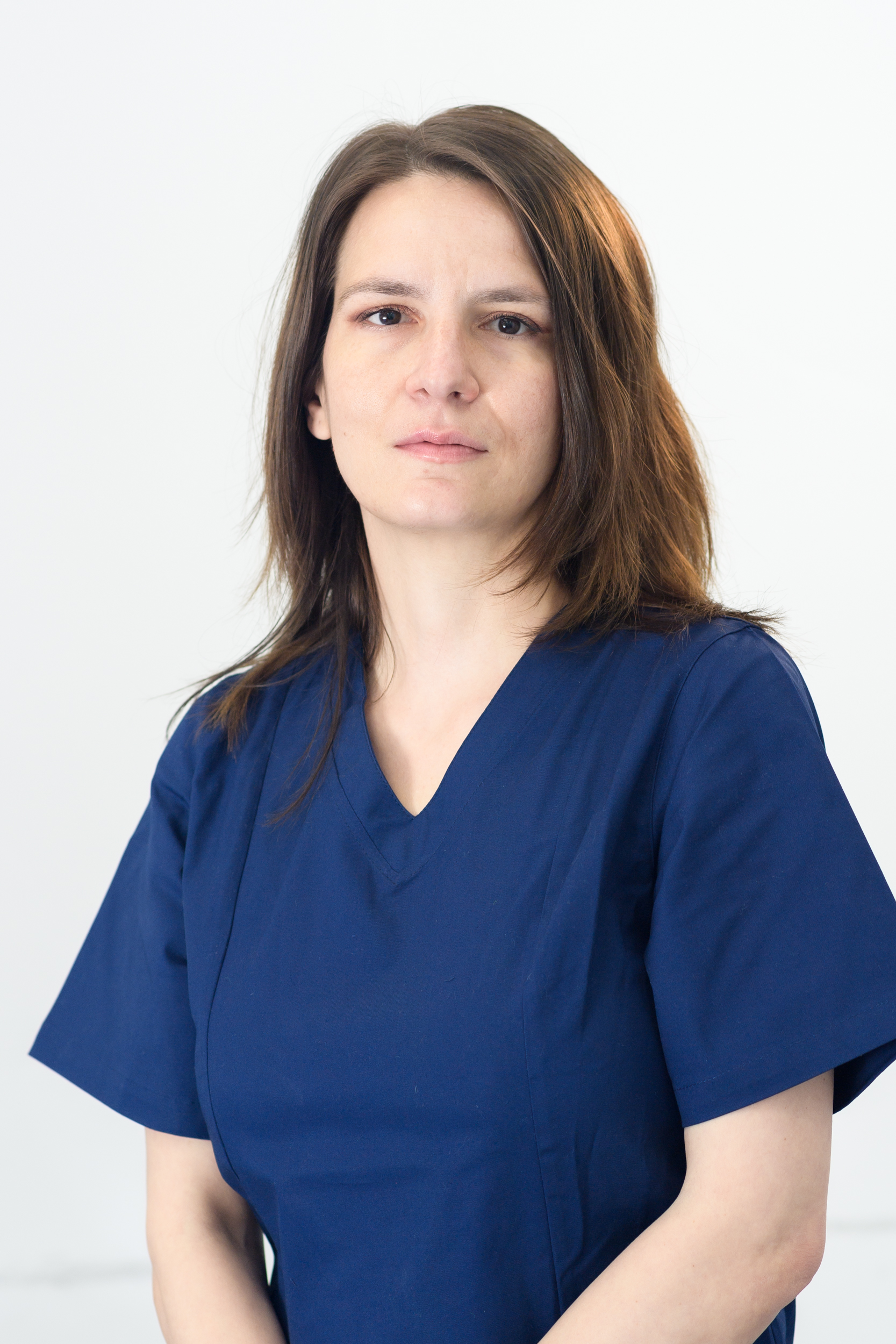 Dr.   Manuela-Elena Vanghele